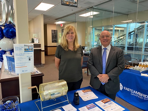 Bank President and Chief Lending Officer Tim Bombard and Woburn Banking Center Business Development Manager Susan Shaw draw the first raffle prize on Monday, July 31. 
