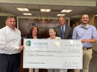 Bank President and CEO presenting donation to Somerville-Cambridge Elder Services