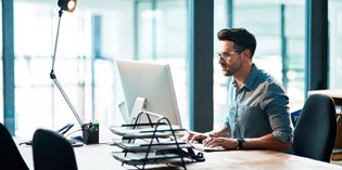 Business owner working at computer