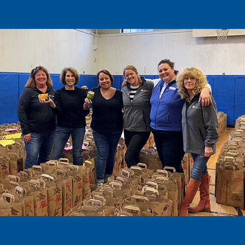 A group of Bank employees volunteering at the East End House in Cambridge.