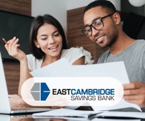 Couple looking at piece of paper